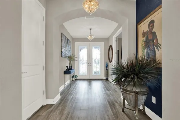 a kitchen with a dining table and chairs