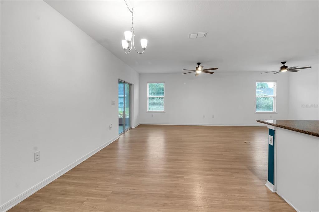 4322 Kiska Road North Port, FL 34288 - Photo 19 of 67 a view of a room with wooden floor and window