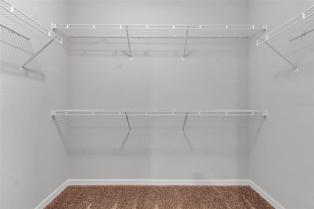 4322 Kiska Road North Port, FL 34288 - Photo 22 of 67 a view of a room with racks on the wall