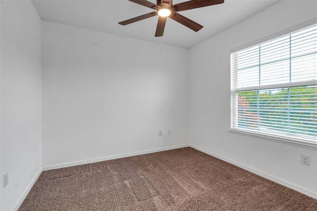 4322 Kiska Road North Port, FL 34288 - Photo 29 of 67 a view of an empty room with a window