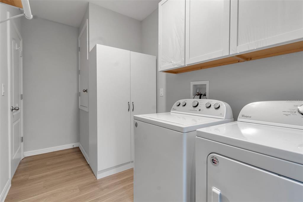 4322 Kiska Road North Port, FL 34288 - Photo 34 of 67 a utility room with dryer and washer