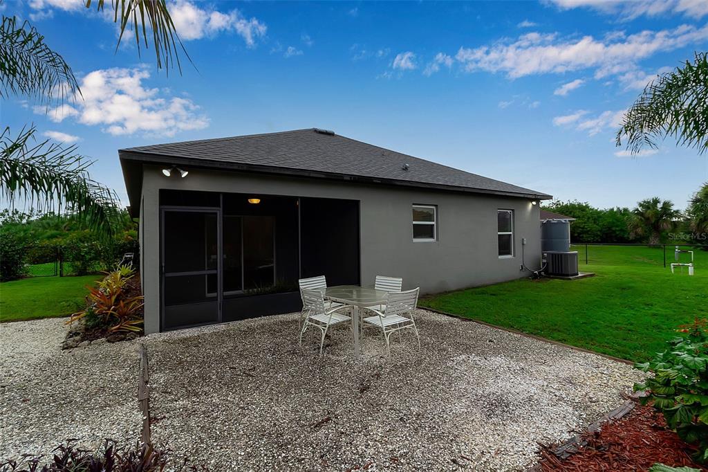 4322 Kiska Road North Port, FL 34288 - Photo 42 of 67 a view of a house with backyard and sitting area