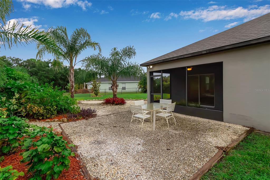 4322 Kiska Road North Port, FL 34288 - Photo 43 of 67 a view of a house with backyard and sitting area