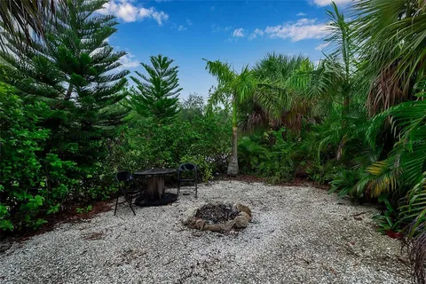 an aerial view of residential house with outdoor space and garden