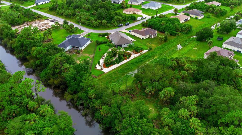 4322 Kiska Road North Port, FL 34288 - Photo 61 of 67 a view of a garden with a tree