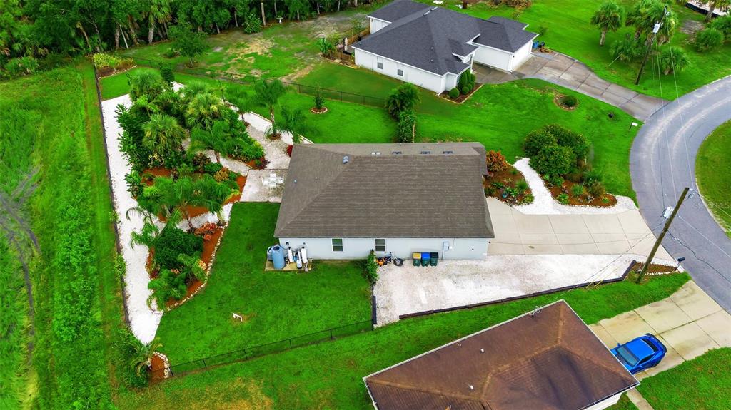 4322 Kiska Road North Port, FL 34288 - Photo 63 of 67 an aerial view of a house with garden space and street view