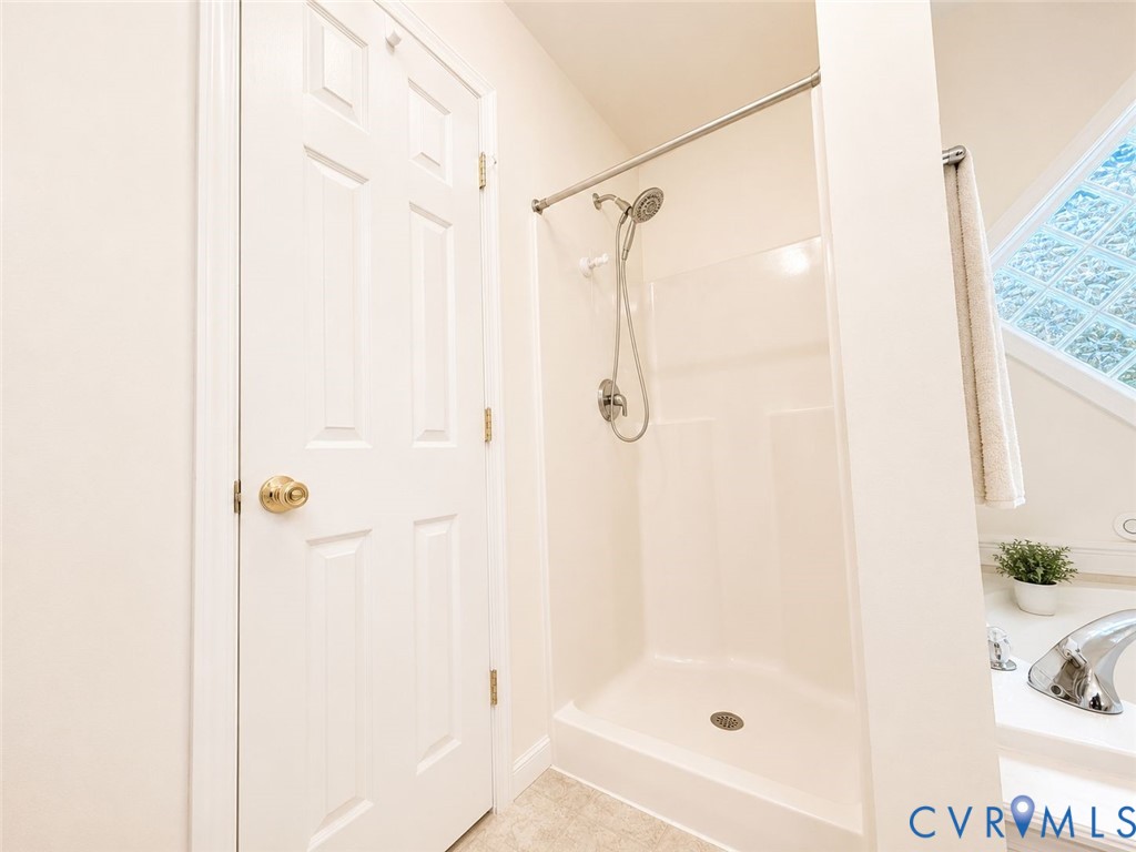 Undisclosed Address Rice, VA 23966 - Photo 19 of 31 Walk-in shower with a chrome fixture, surrounded b