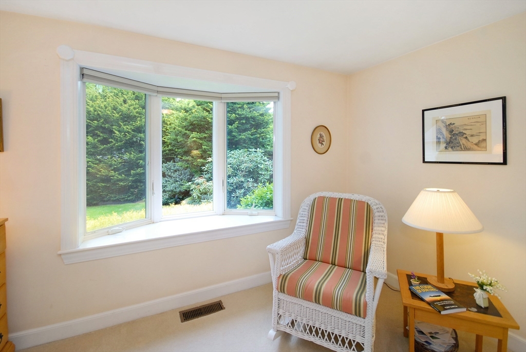 51 MacArthur Road Concord, MA 01742 - Photo 22 of 42 a living room with furniture and a window