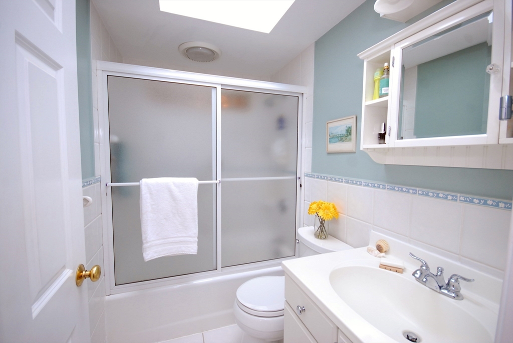 51 MacArthur Road Concord, MA 01742 - Photo 24 of 42 a bathroom with a sink vanity granite and toilet