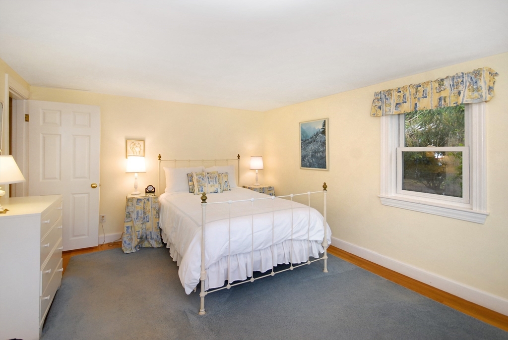 51 MacArthur Road Concord, MA 01742 - Photo 25 of 42 a bedroom with a bed and window