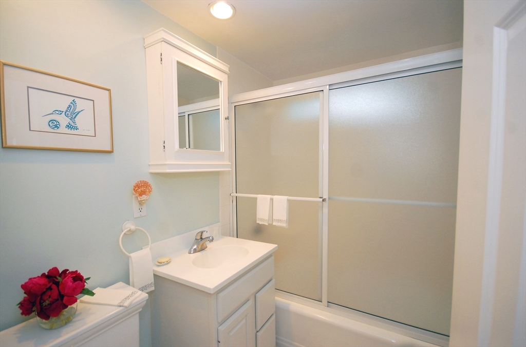51 MacArthur Road Concord, MA 01742 - Photo 27 of 42 a bathroom with a sink vanity and toilet