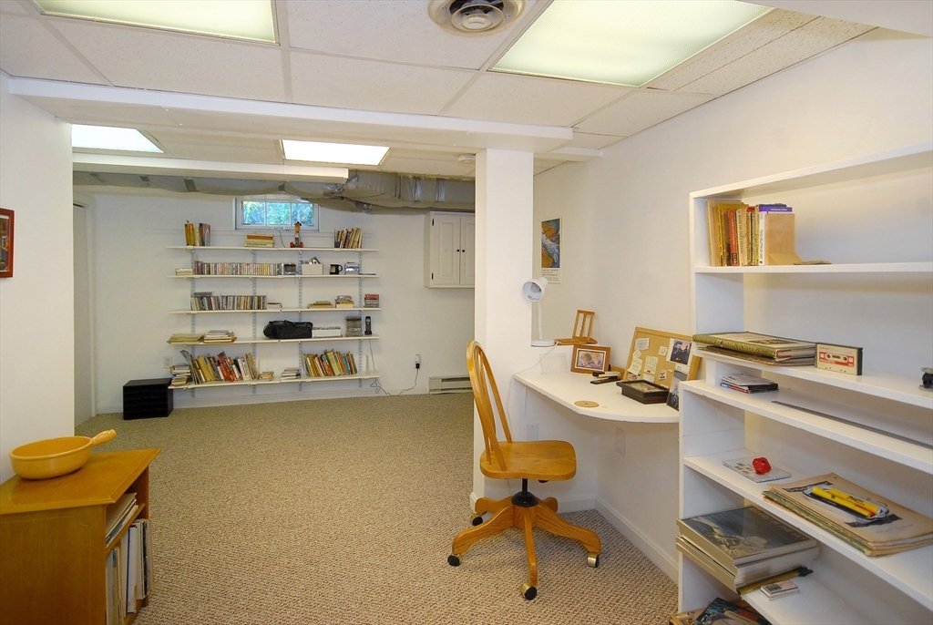 51 MacArthur Road Concord, MA 01742 - Photo 29 of 42 a view of a workspace with furniture