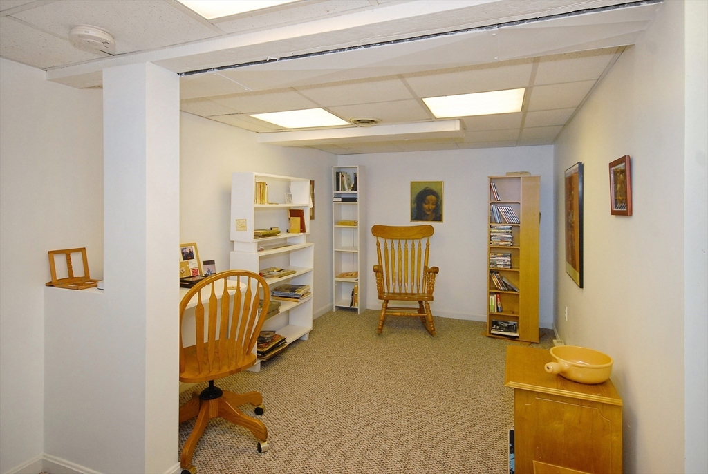 51 MacArthur Road Concord, MA 01742 - Photo 30 of 42 a view of a livingroom with furniture and windows