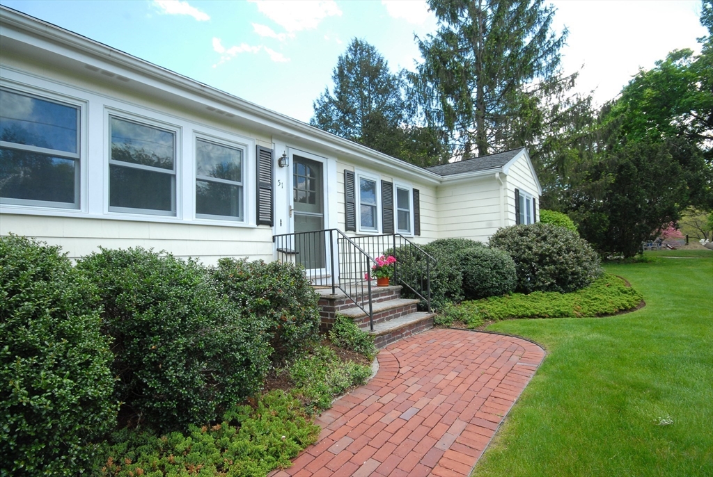 51 MacArthur Road Concord, MA 01742 - Photo 38 of 42 a house view with a garden space