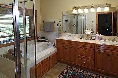 137 Knudson Ranch Road, Unit 137 Edwards, CO 81632 - Photo 7 of 8 a bathroom with a sink double vanity and a mirror