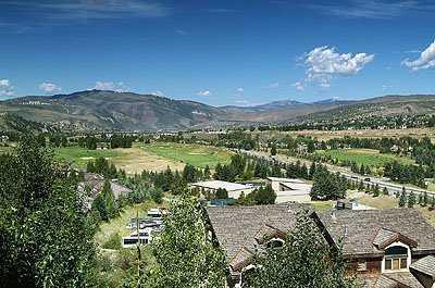 137 Knudson Ranch Road, Unit 137 Edwards, CO 81632 - Photo 8 of 8 a view of a city with mountains in the background