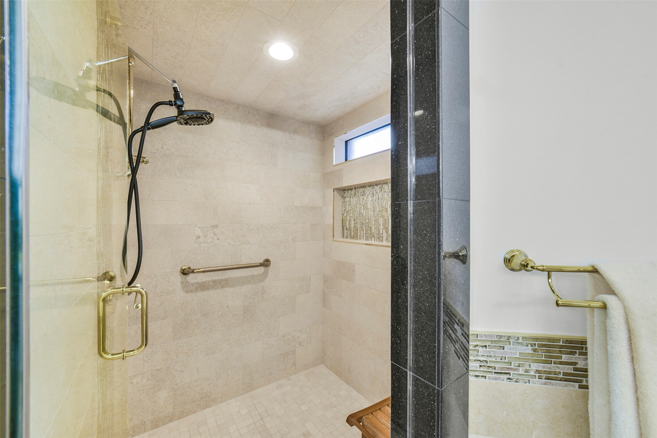 17302 Atherington Place Spring, TX 77379 - Photo 27 of 50 Oversized walk-in shower in primary bath with newly added seamless glass door.