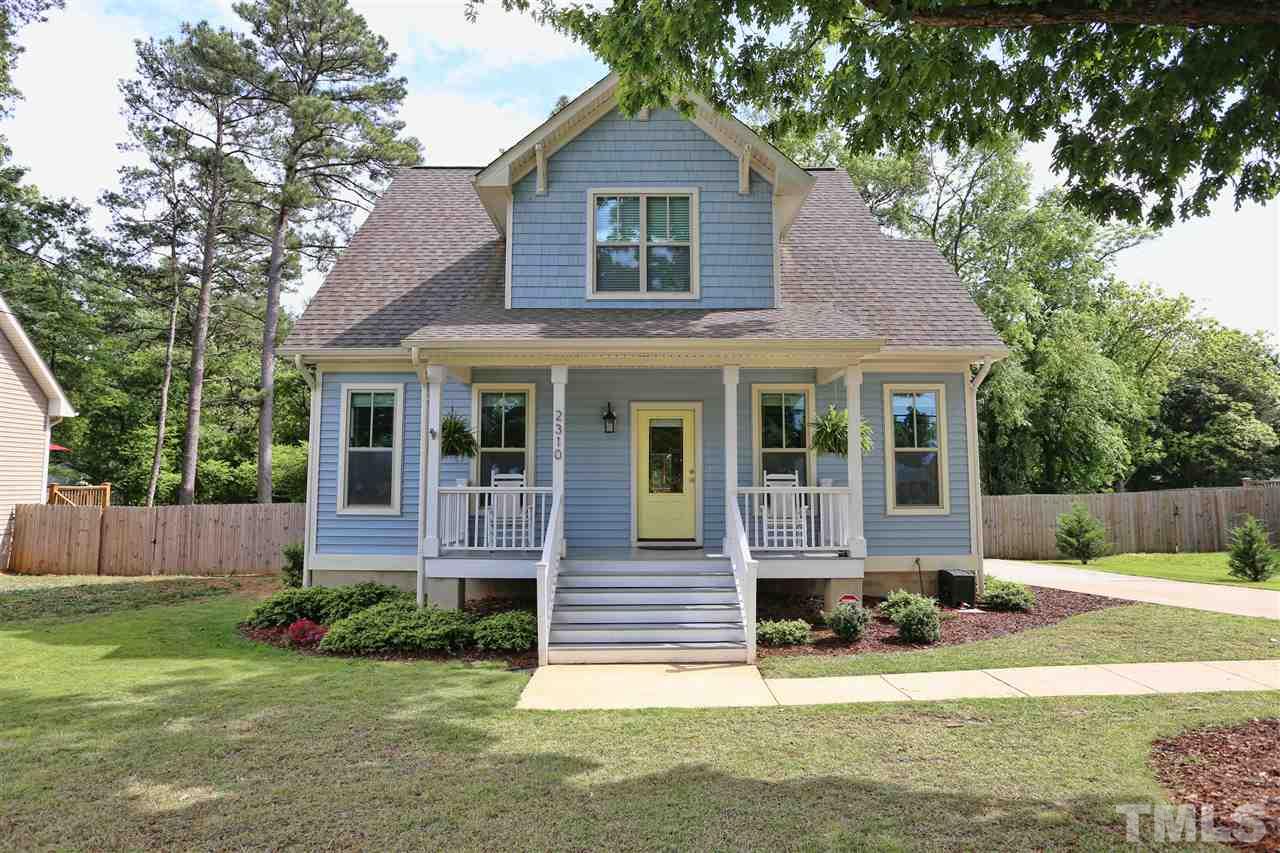 2310 Milburnie Road Raleigh, NC 27610 - Photo 1 of 25 front view of a house with a yard