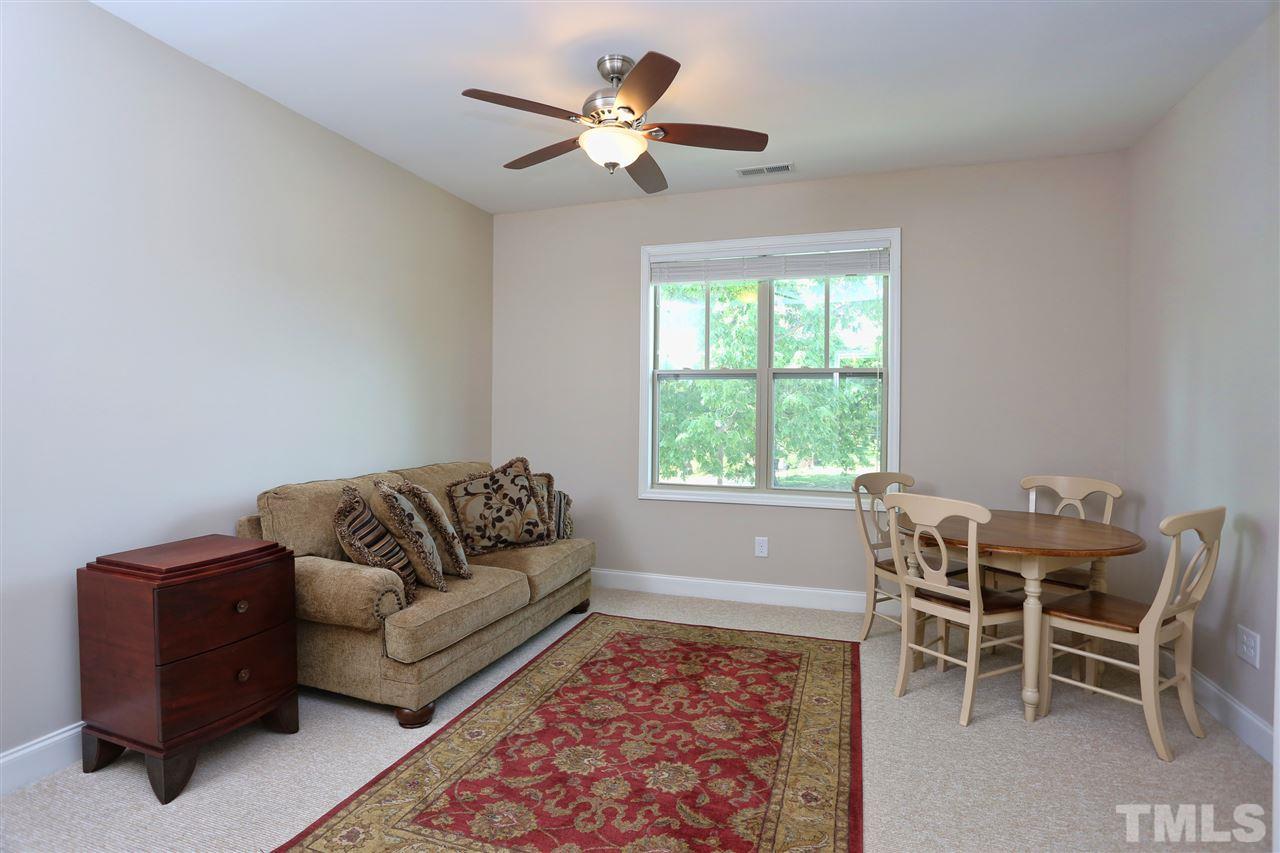 2310 Milburnie Road Raleigh, NC 27610 - Photo 18 of 25 a living room with furniture and a window