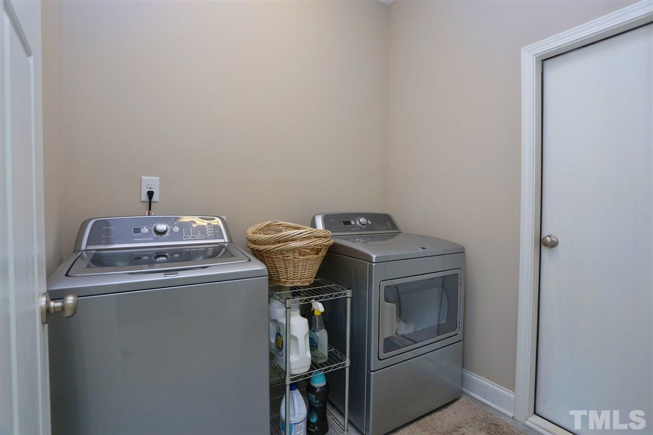 2310 Milburnie Road Raleigh, NC 27610 - Photo 21 of 25 a utility room with dryer and washer