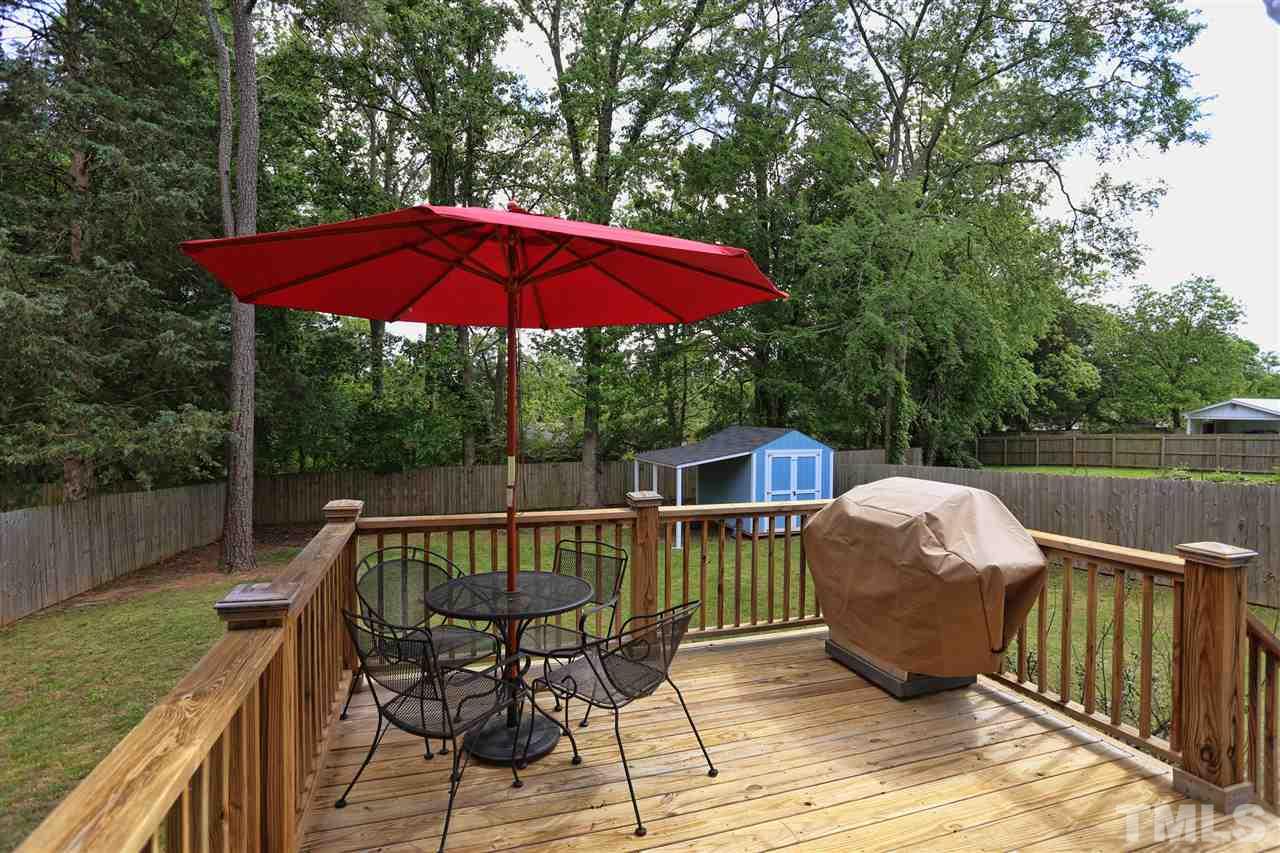 2310 Milburnie Road Raleigh, NC 27610 - Photo 22 of 25 a view of balcony with outdoor seating and city view