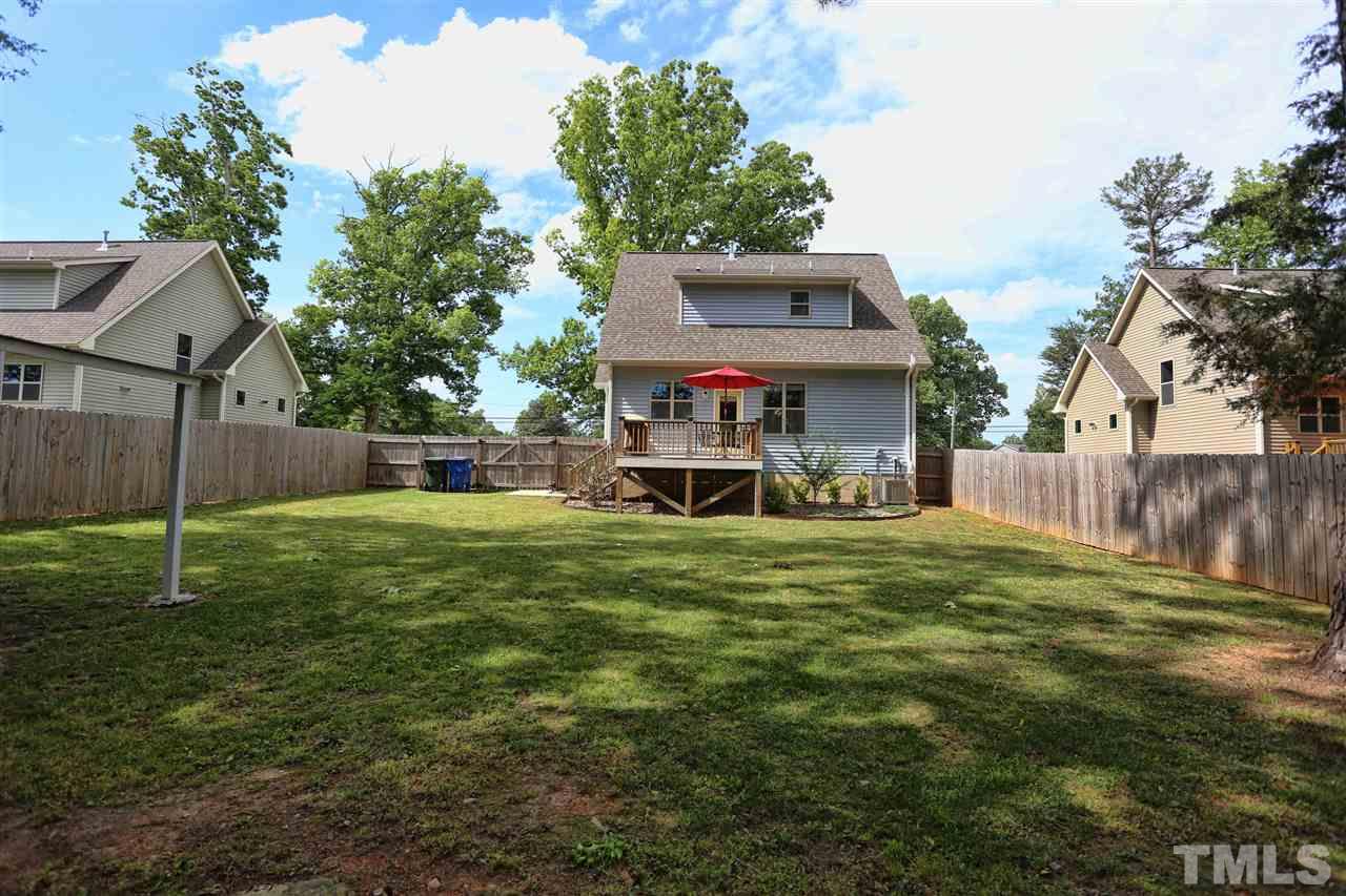 2310 Milburnie Road Raleigh, NC 27610 - Photo 25 of 25 a house view with a play ground in front of it