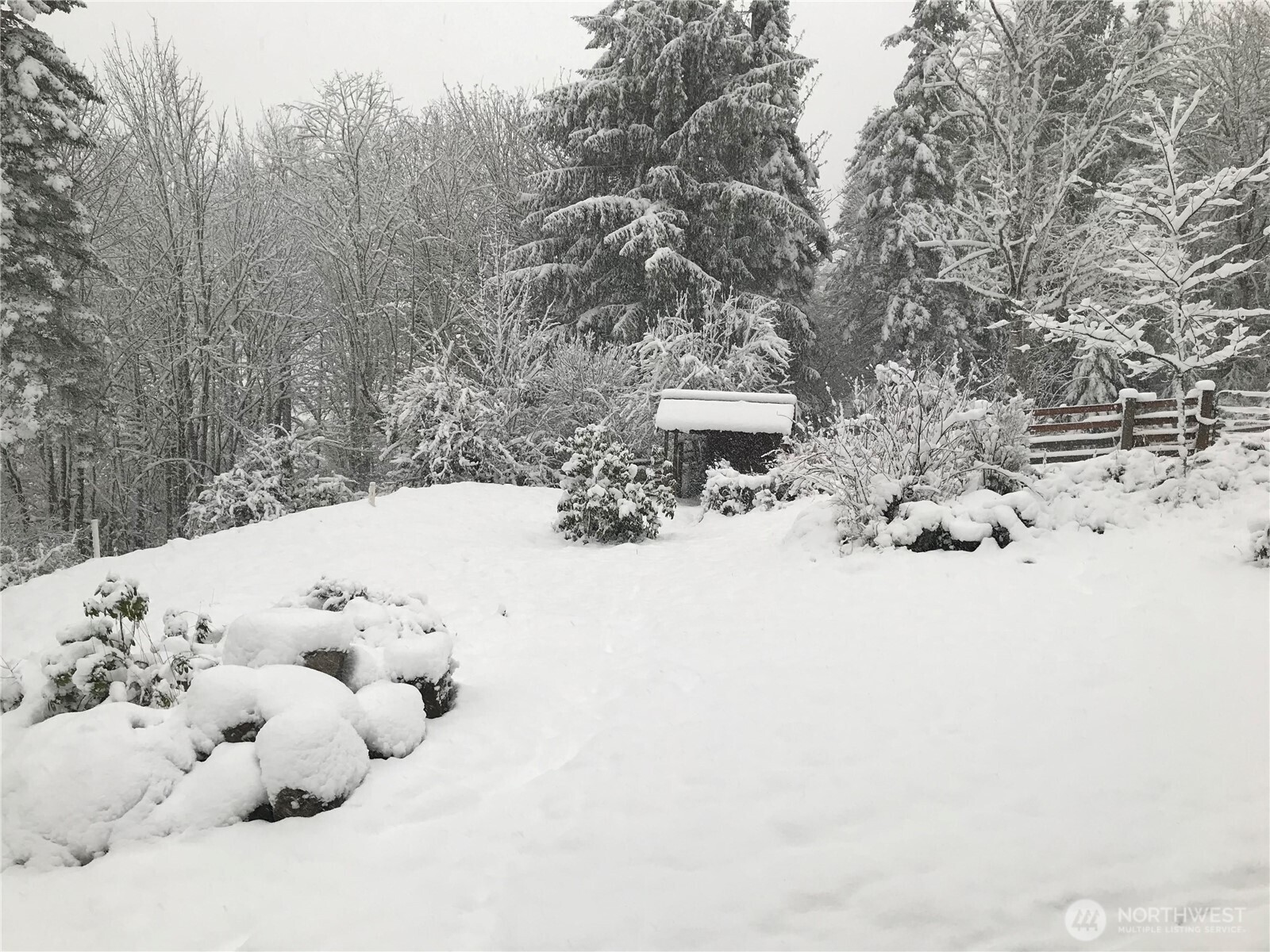 106 Crocker Lake Road Quilcene, WA 98376 - Photo 32 of 34 a view of white house with a snow in between