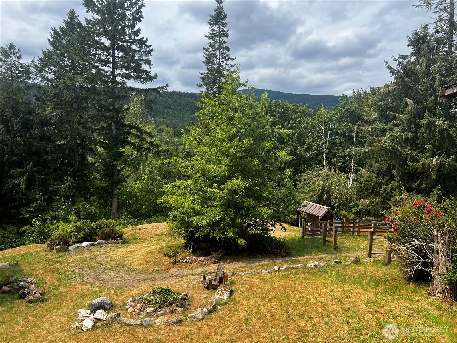 106 Crocker Lake Road Quilcene, WA 98376 - Photo 34 of 34 a view of an outdoor space and a yard