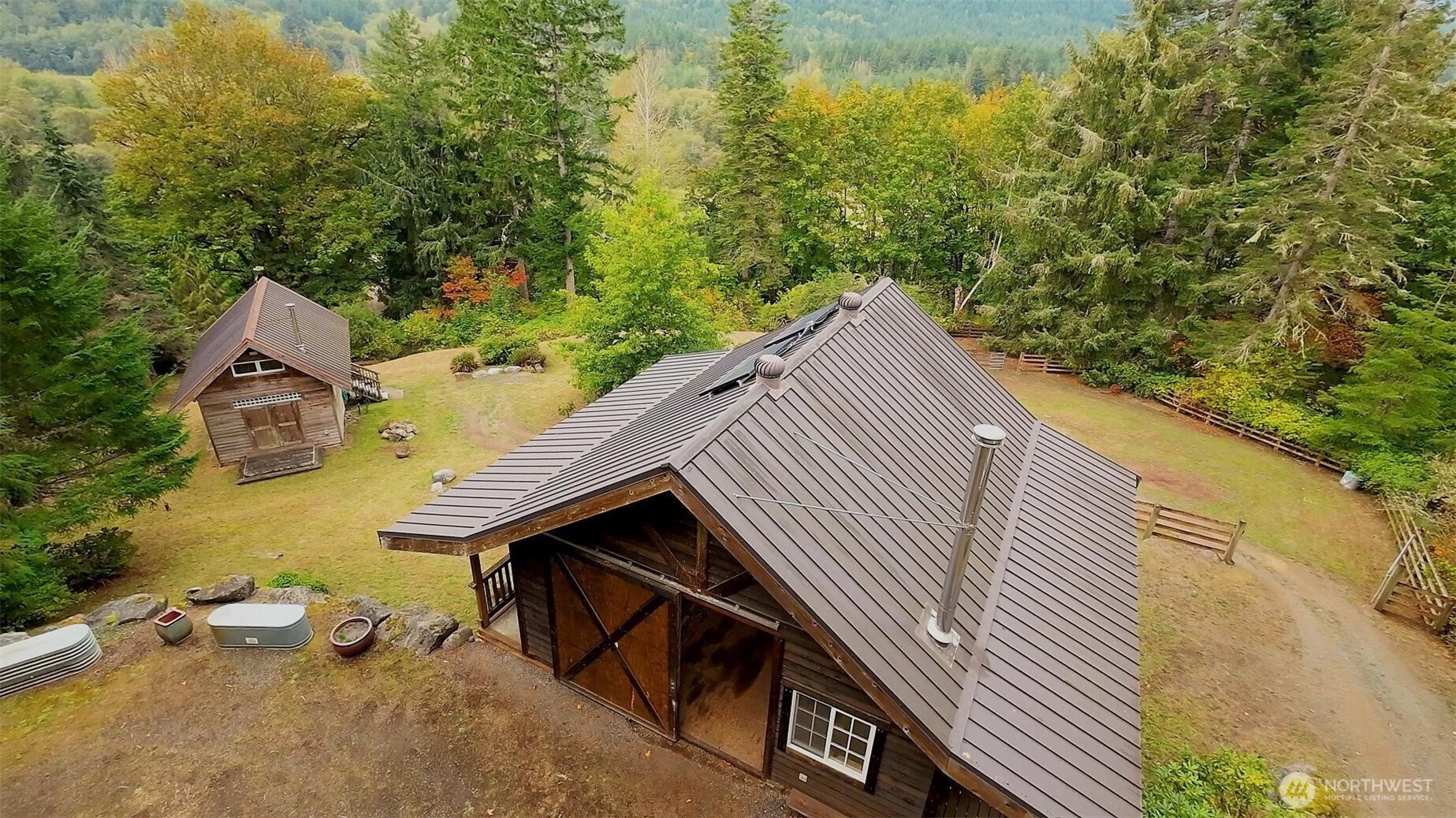 106 Crocker Lake Road Quilcene, WA 98376 - Photo 4 of 34 a view of outdoor space and seating area