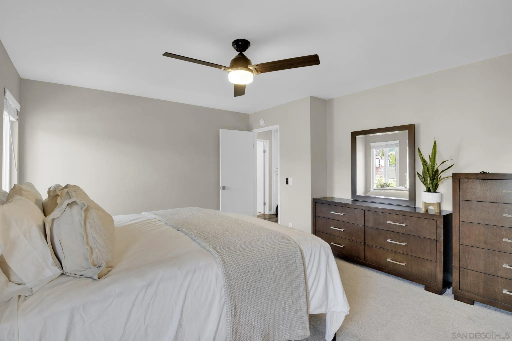 12408 Laja Drive Poway, CA 92064 - Photo 26 of 41 a bedroom with a bed and a dresser