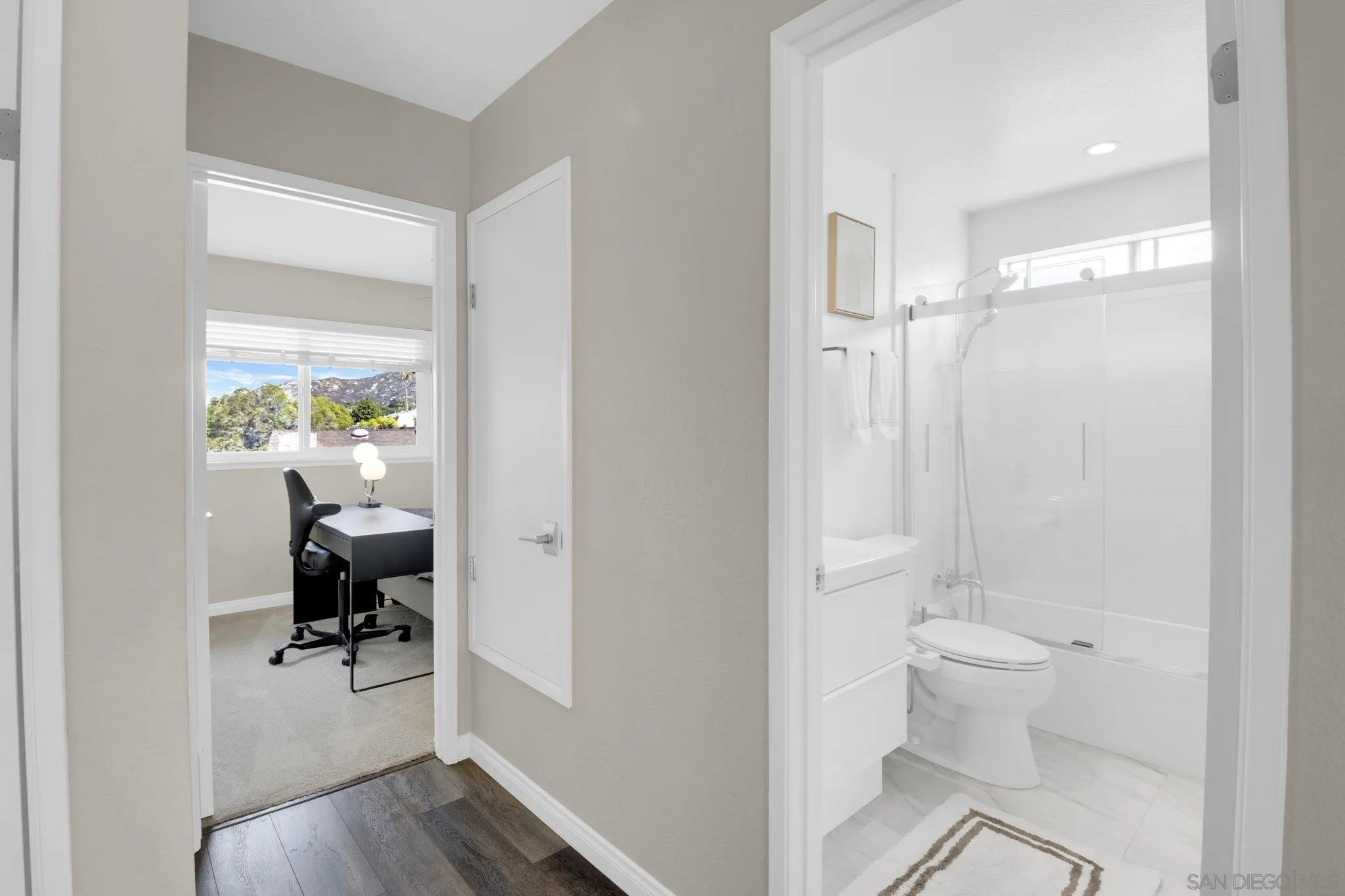 12408 Laja Drive Poway, CA 92064 - Photo 28 of 41 a view of a bathroom with a toilet and a shower