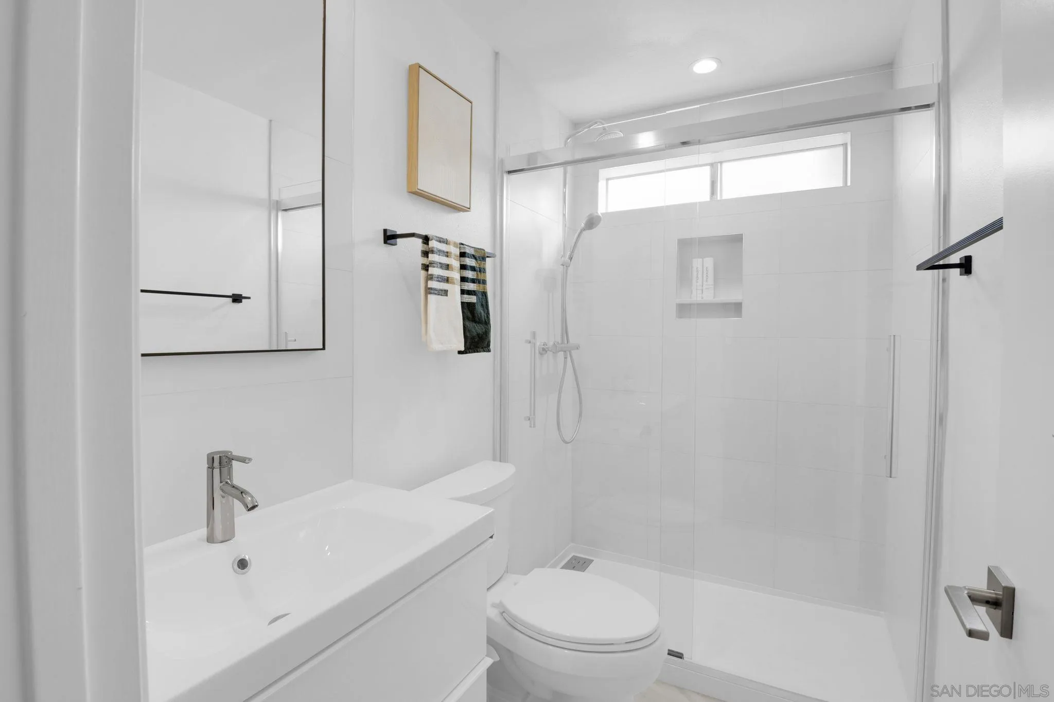 12408 Laja Drive Poway, CA 92064 - Photo 30 of 41 a bathroom with a bathtub shower sink vanity and toilet