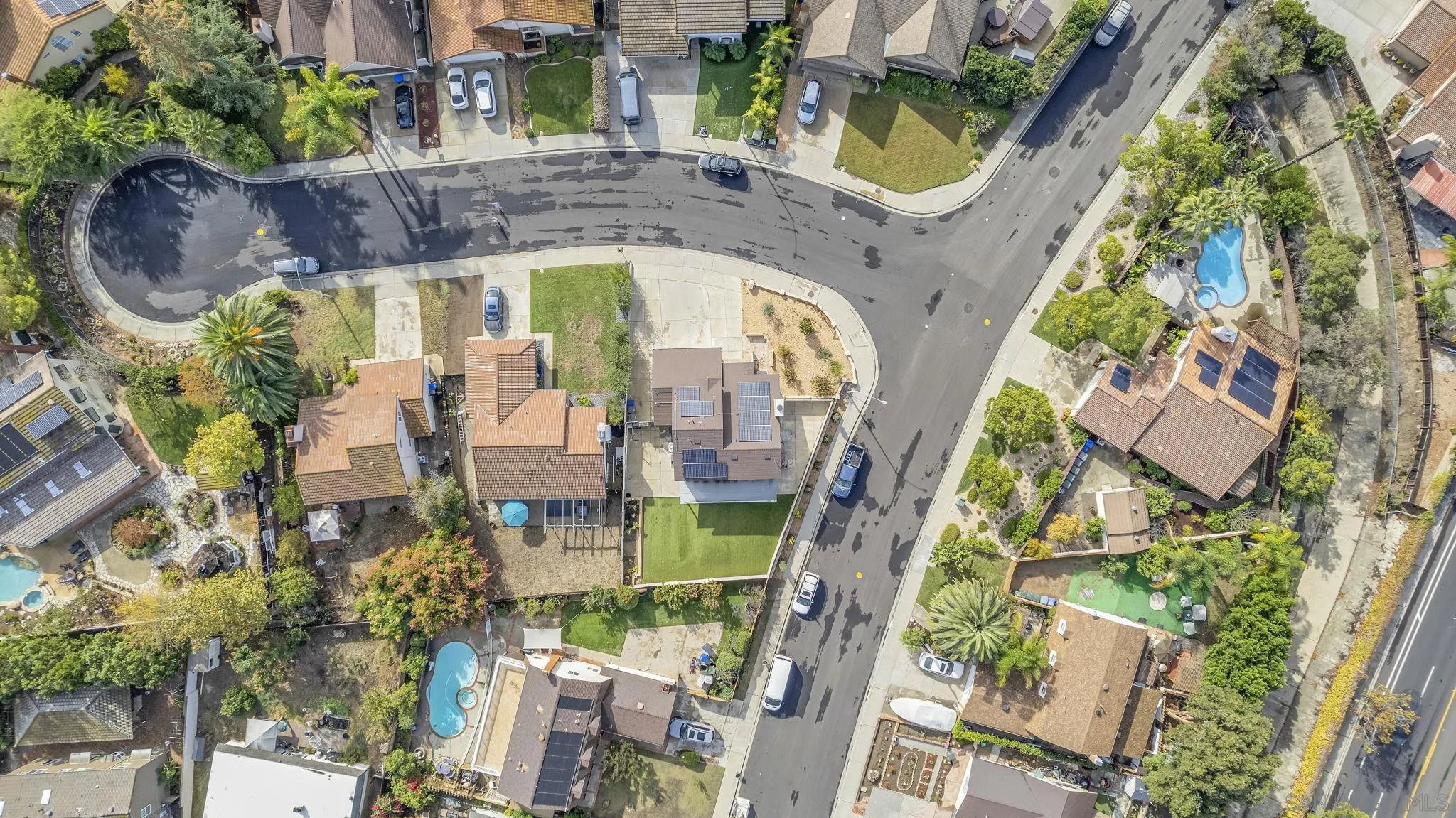 12408 Laja Drive Poway, CA 92064 - Photo 41 of 41 an aerial view of a residential apartment building with a yard and potted plants