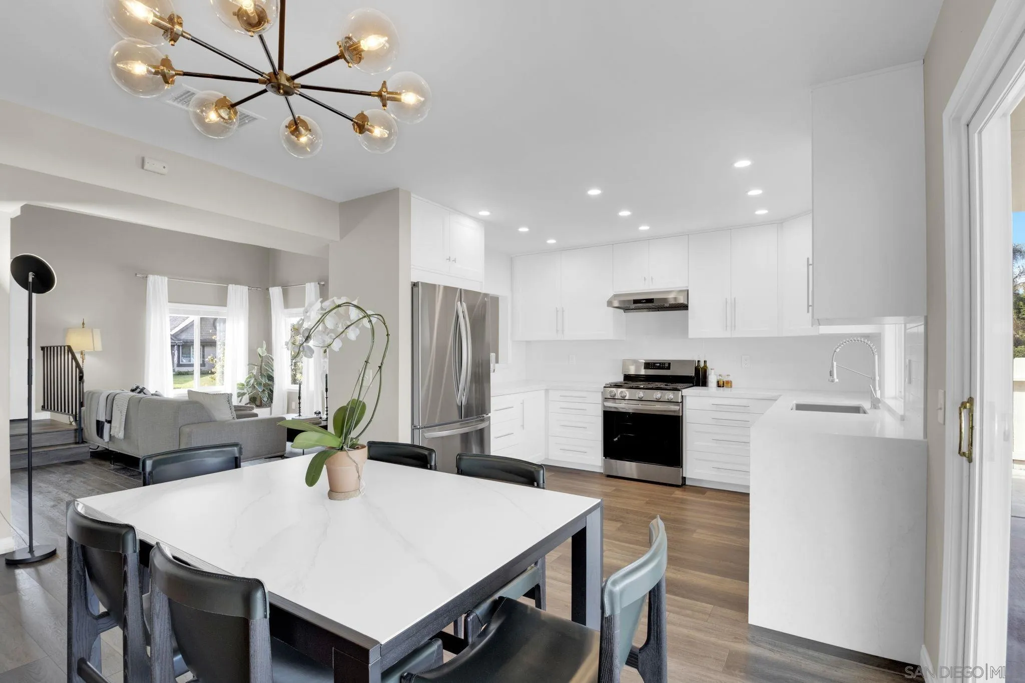 12408 Laja Drive Poway, CA 92064 - Photo 10 of 41 a large kitchen with a table and chairs