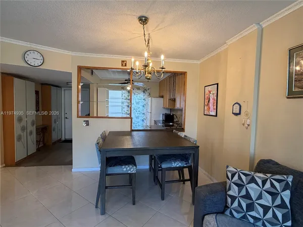a bathroom with a sink mirror toilet and shower