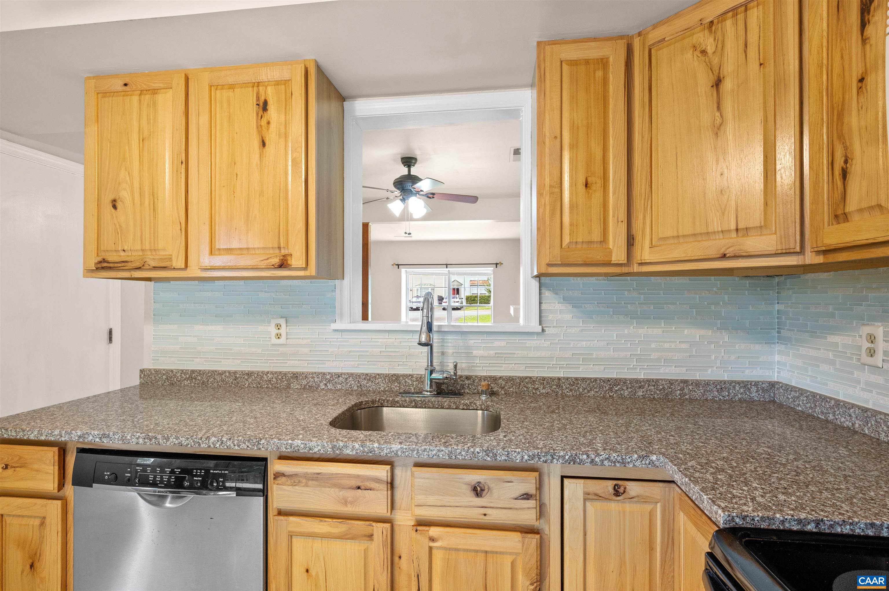 1616 Cool Spring Road Charlottesville, VA 22901 - Photo 15 of 38 a kitchen with granite countertop cabinets and window