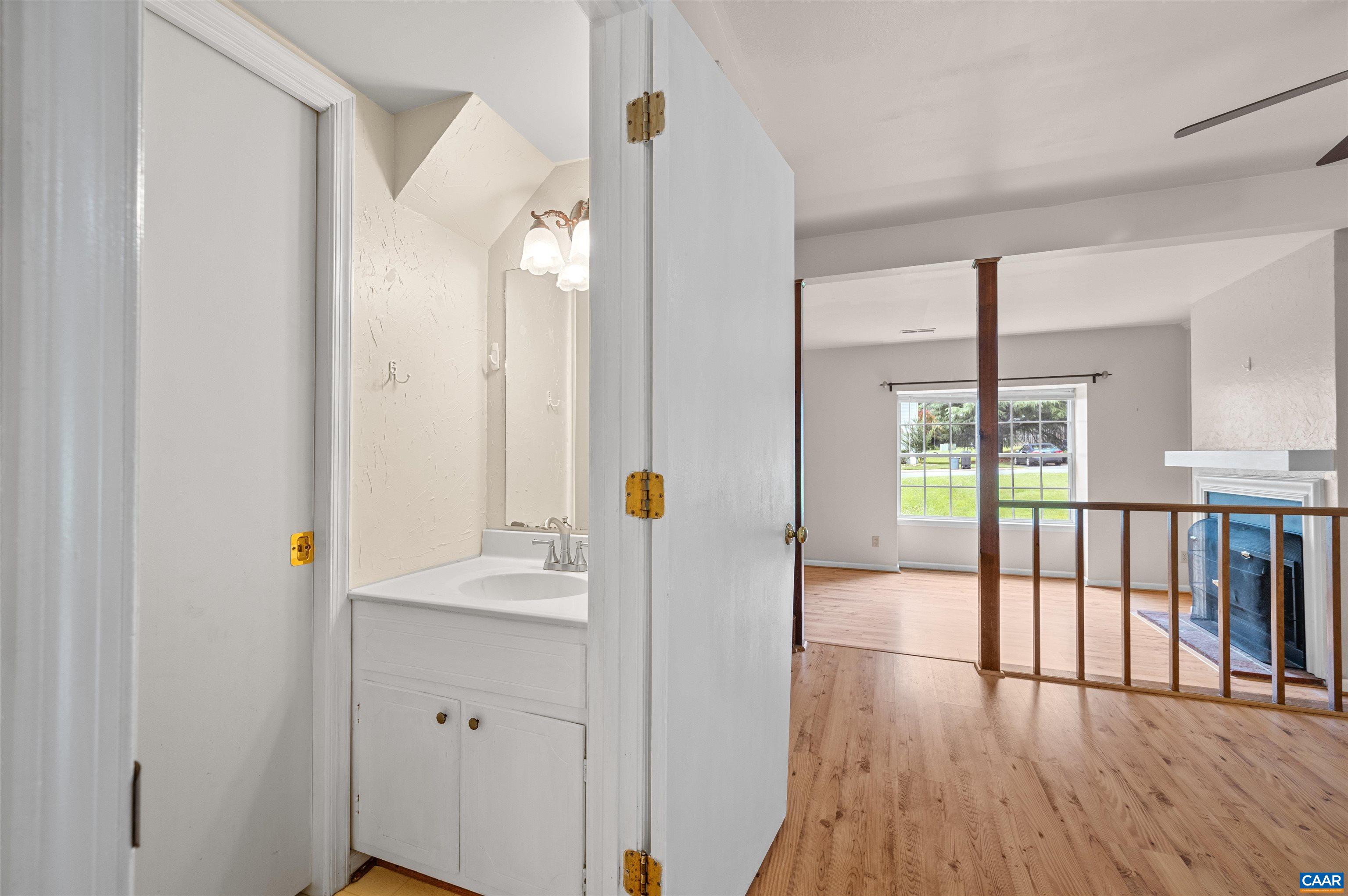 1616 Cool Spring Road Charlottesville, VA 22901 - Photo 18 of 38 a bathroom with a sink and a mirror