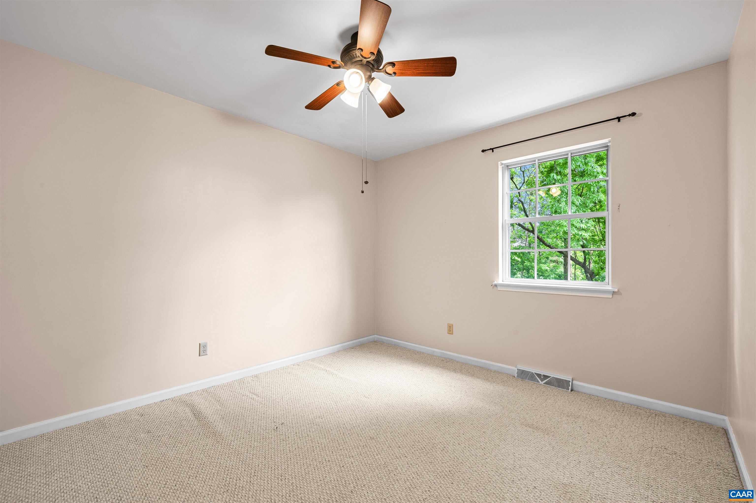 1616 Cool Spring Road Charlottesville, VA 22901 - Photo 28 of 38 an empty room with a window and a ceiling fan