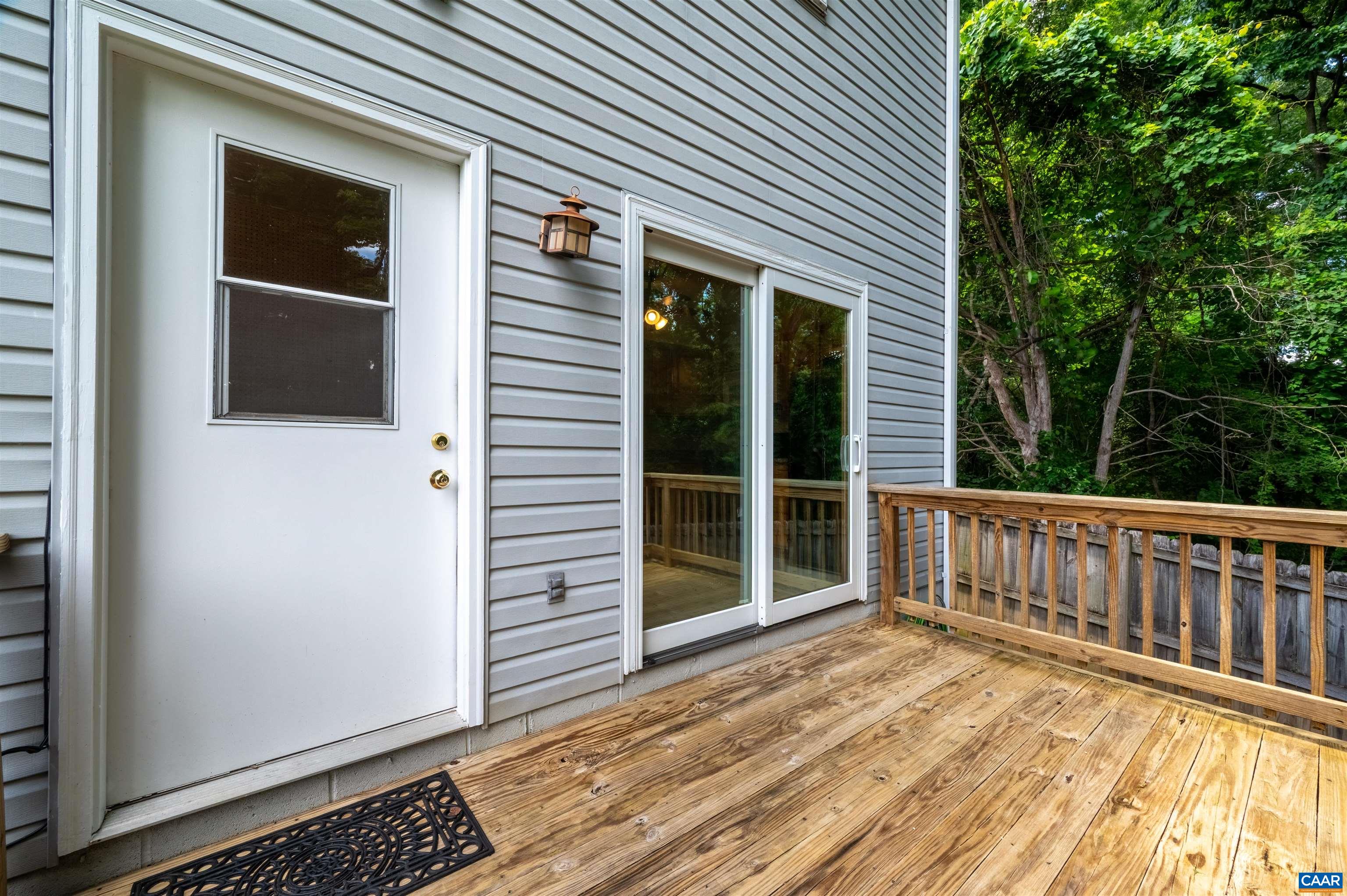 1616 Cool Spring Road Charlottesville, VA 22901 - Photo 34 of 38 a view of deck with a large window and wooden fence