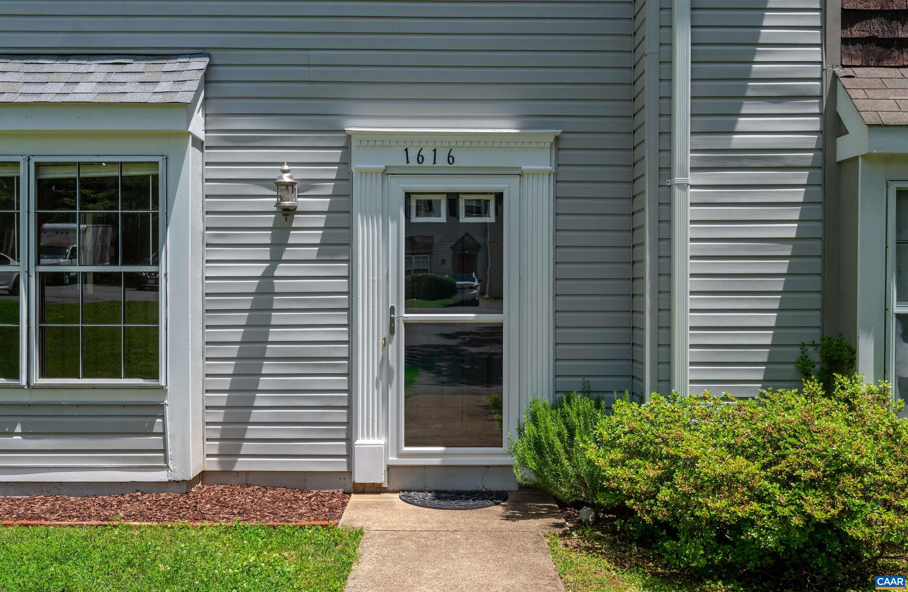 1616 Cool Spring Road Charlottesville, VA 22901 - Photo 5 of 38 a front view of a house with a yard