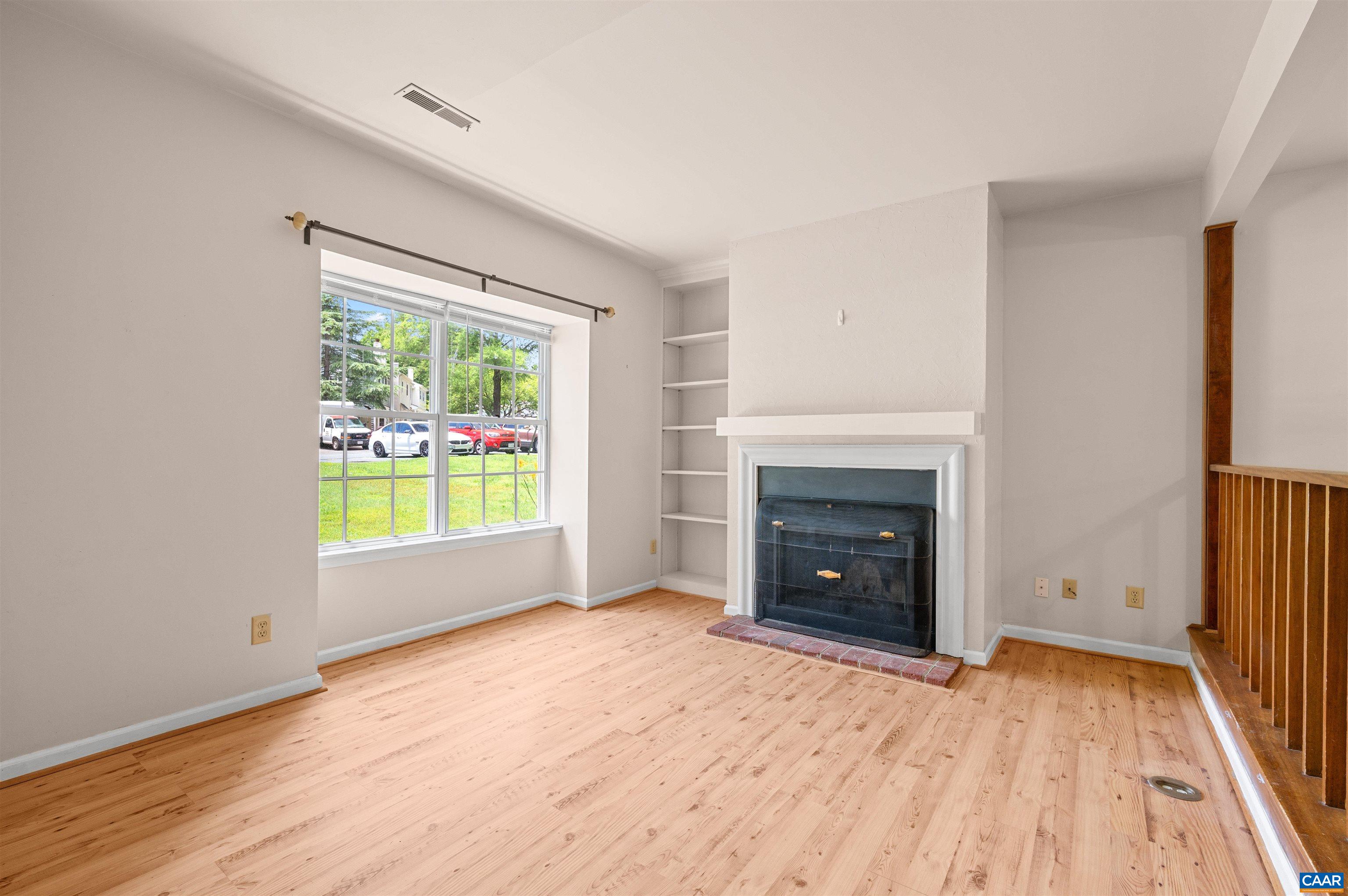 1616 Cool Spring Road Charlottesville, VA 22901 - Photo 7 of 38 an empty room with window and a fireplace