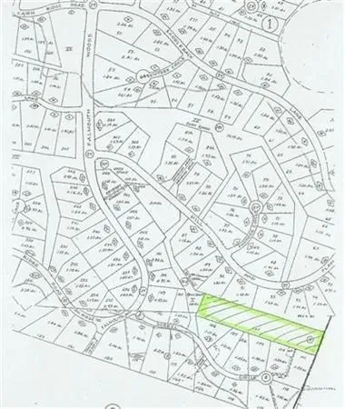 en suite bathroom with a sink and a shower curtain