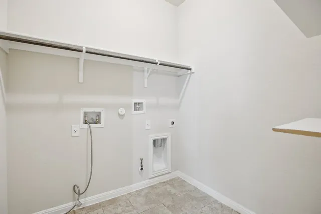 a view of a hallway with entryway