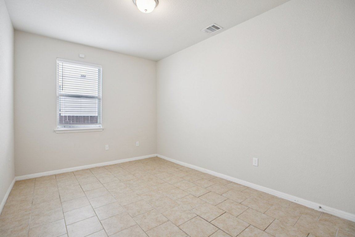 176 Mayney Ln. Leander, TX 78641 - Photo 23 of 34 Unfurnished room with baseboards