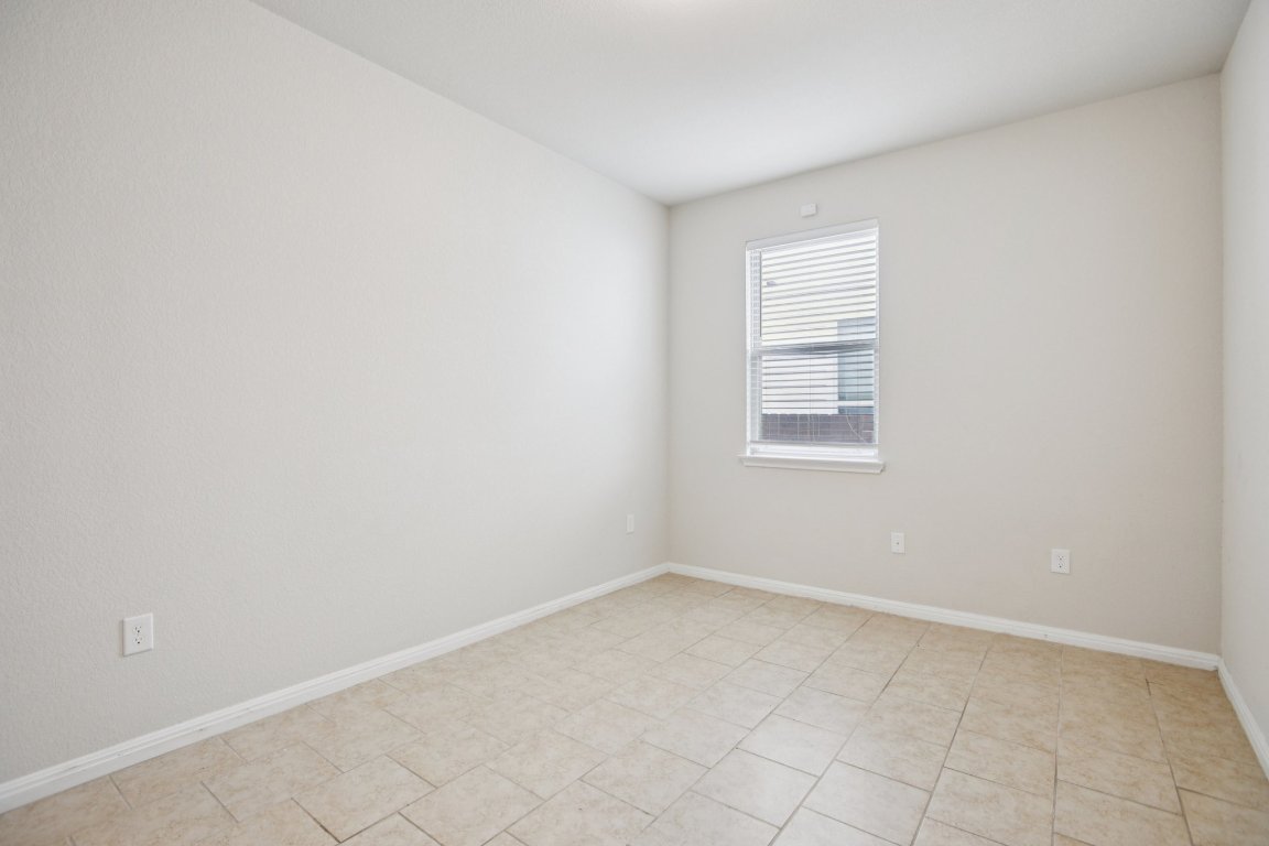176 Mayney Ln. Leander, TX 78641 - Photo 24 of 34 Unfurnished room featuring baseboards