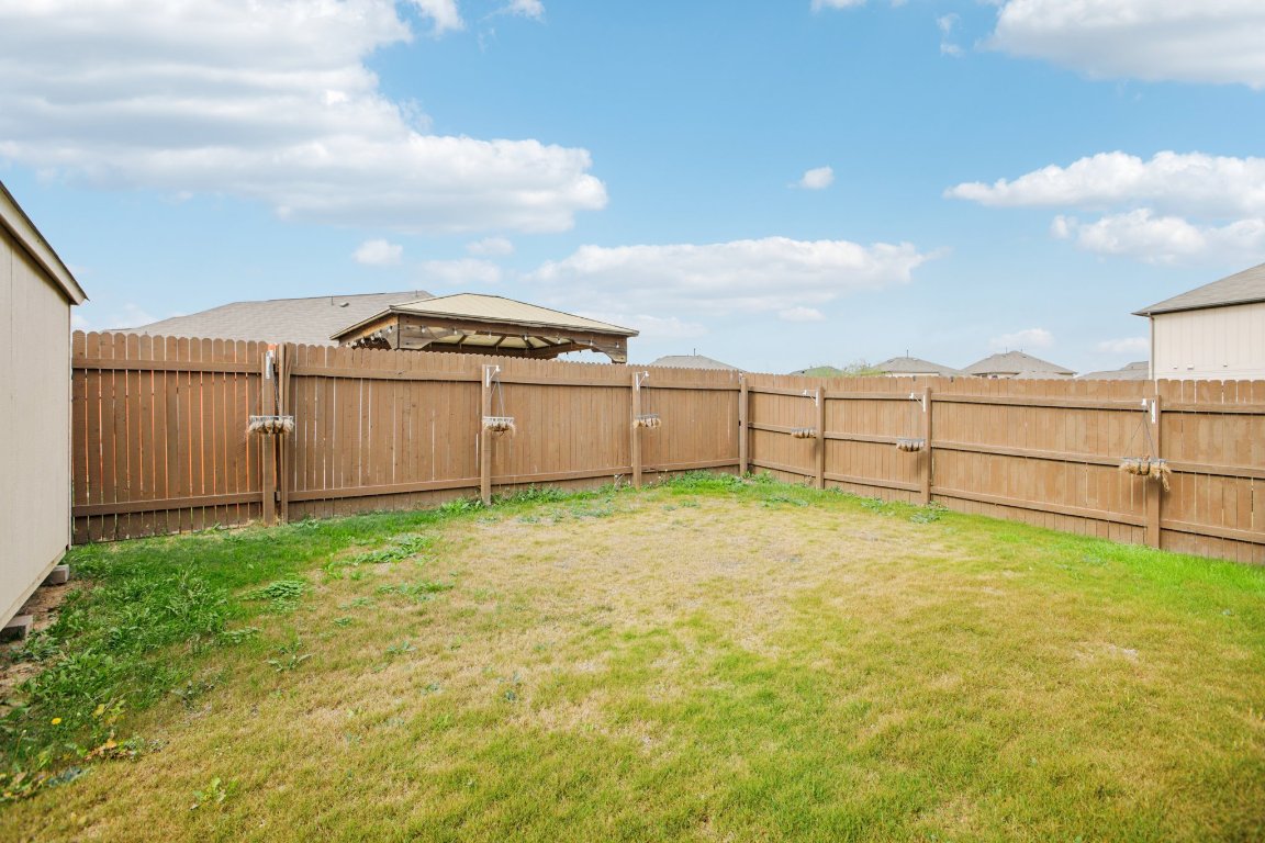176 Mayney Ln. Leander, TX 78641 - Photo 33 of 34 View of fenced backyard