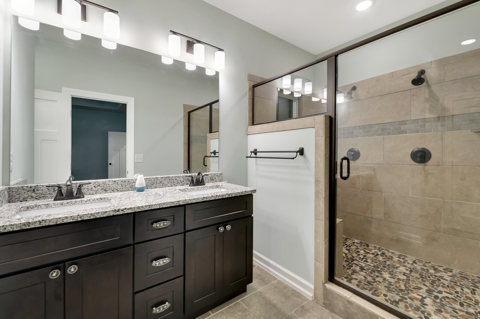 105 Lake Wood Road Lebanon, TN 37087 - Photo 24 of 34 a bathroom with a granite countertop sink mirror and shower