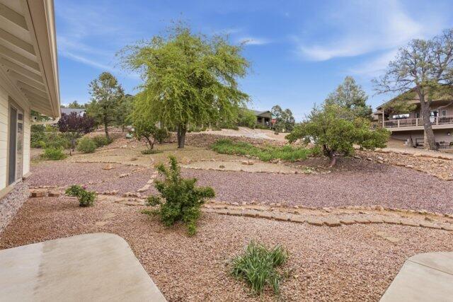 722 Boulder Ridge Road Payson, AZ 85541 - Photo 6 of 29 a view of a yard with potted plants