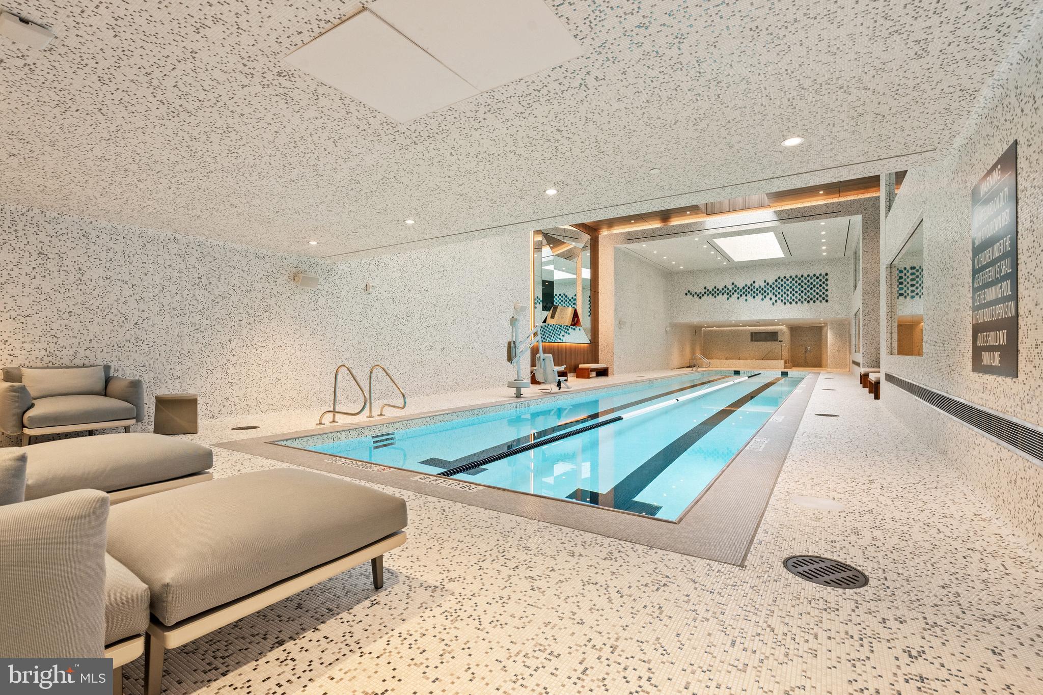 601 Wharf Street Southwest, Unit 213 Washington, DC 20024 - Photo 19 of 24 a living room with furniture and a table