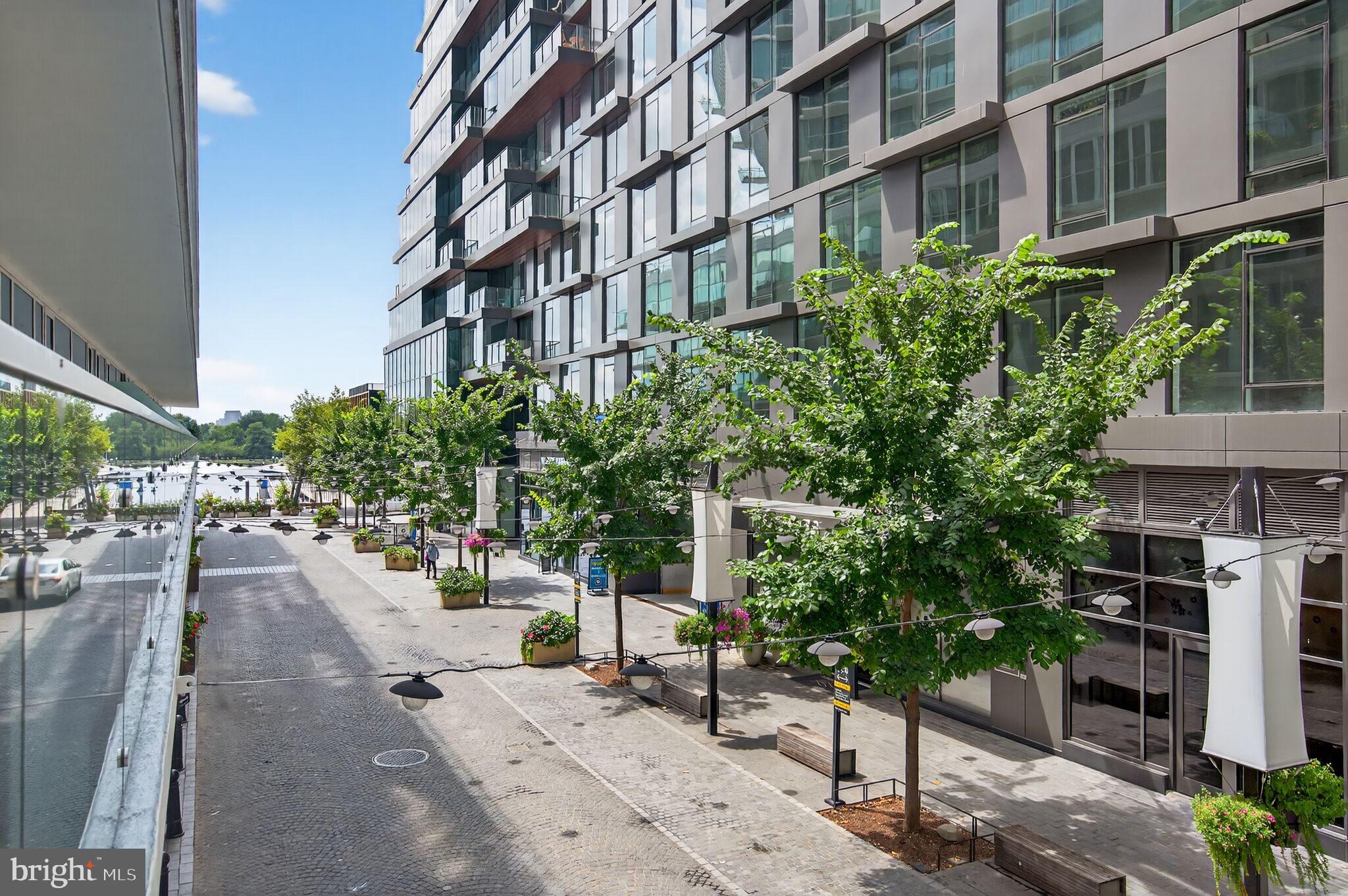 601 Wharf Street Southwest, Unit 213 Washington, DC 20024 - Photo 10 of 24 a view of tall buildings in the background
